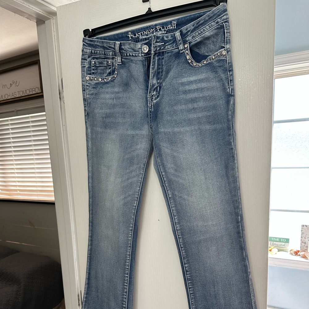 Platinum plush rhinestone guns jeans